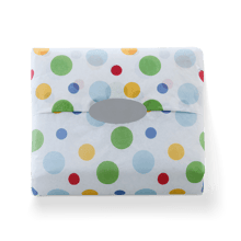 premium white tissue with red, green, yellow, dark and light blue spots of different sizes