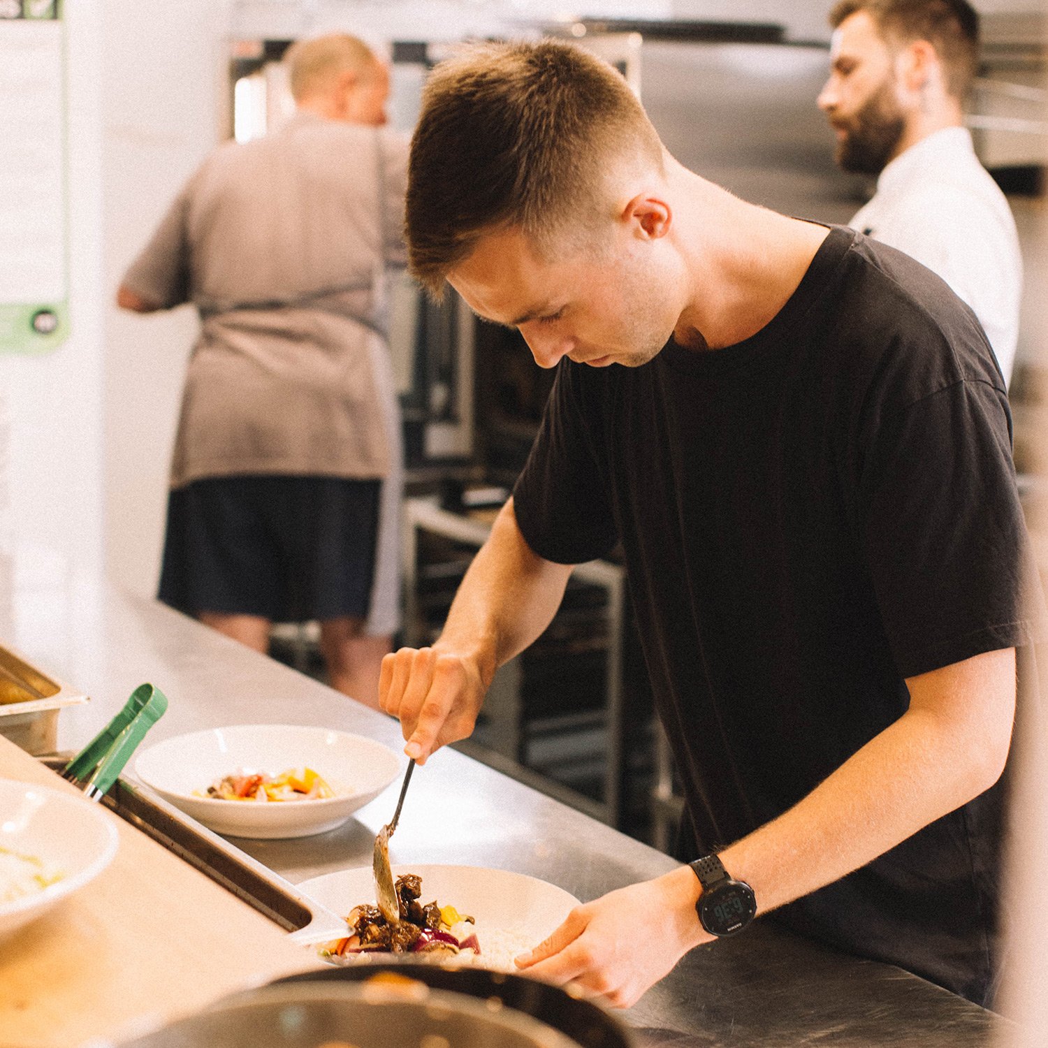 Edward cooking for the Everybody Eats initiative