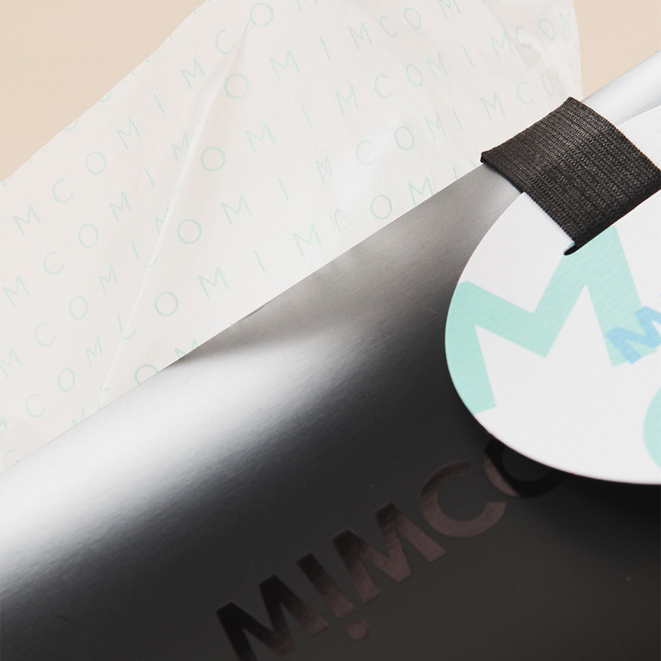 Image of MIMCO gift tag and tissue paper by PaperPak