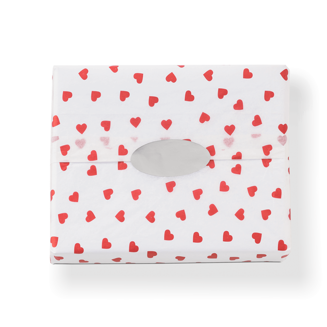 premium white tissue paper with small red hearts