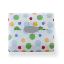 premium white tissue with red, green, yellow, dark and light blue spots of different sizes